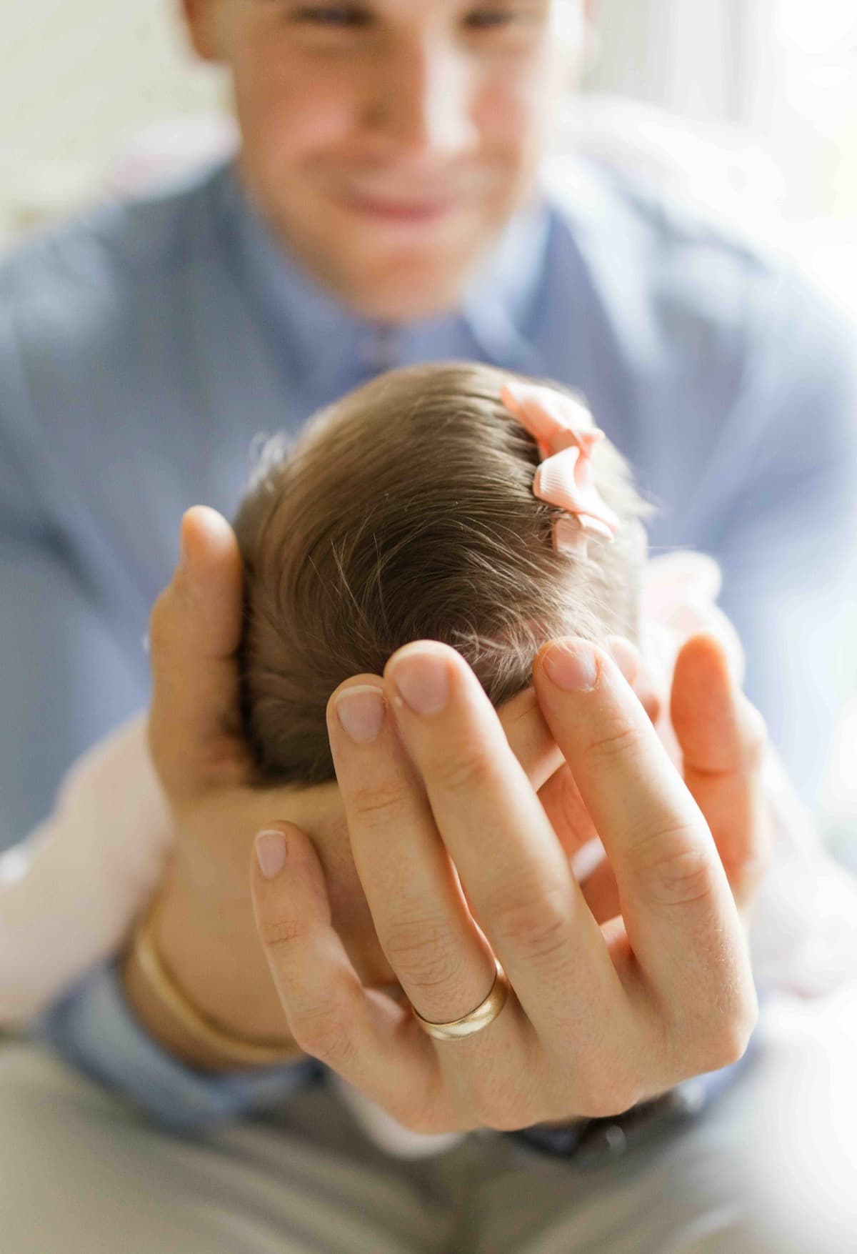 A partner gently supporting a laboring woman